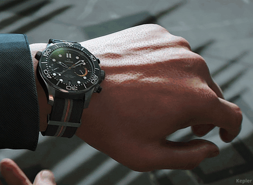 007 First Light James Bond GIF. This 498 x 364 animated GIF is part of our looking at watch collection. Related themes include face, gun, smile. Created by…