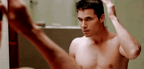 Actor-robbie-amell Fixing-hairstyle GIF