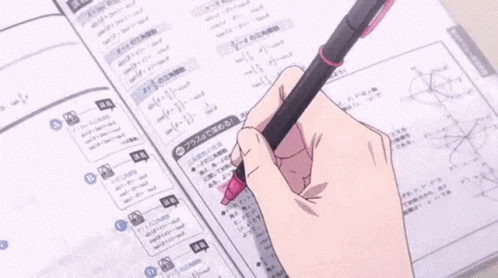 Hand underlining text in a book with a red pen.