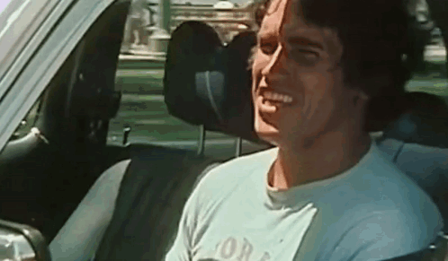 Arnold Schwarzenegger Flexing GIF