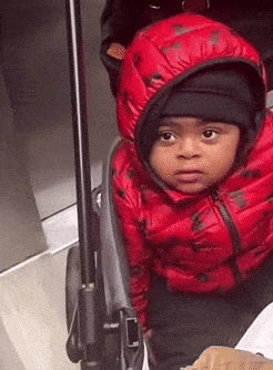 Black Baby Trying Not To Laugh GIF
