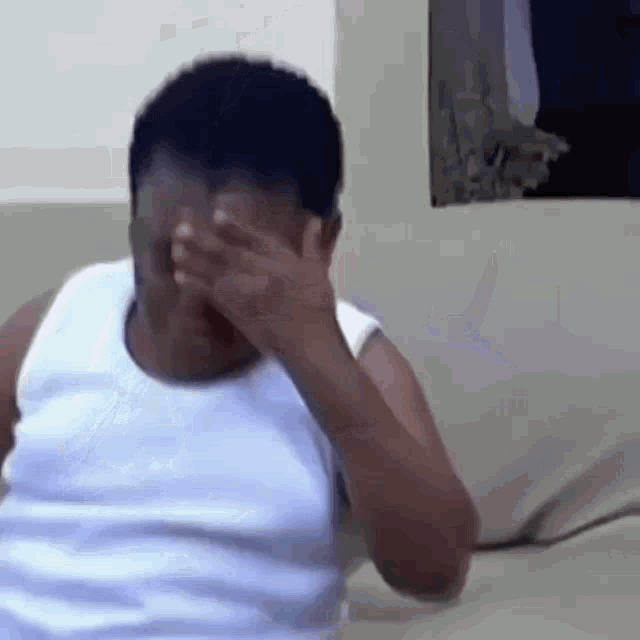 Black Kid Hand Frowb Scratches Head GIF