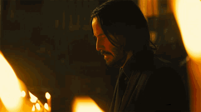 Blowing Out Candle John Wick GIF