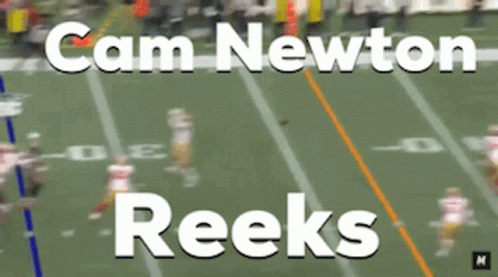 Football player fumbles ball, opponent dives to recover.