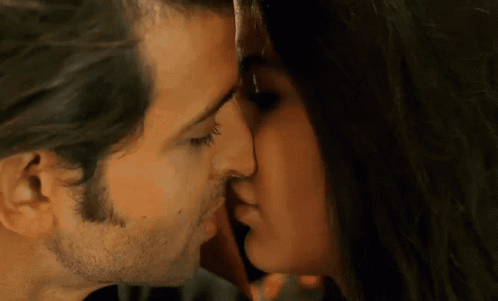 Couple Kisses GIF