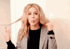 Coy Emily Bett Rickards GIF