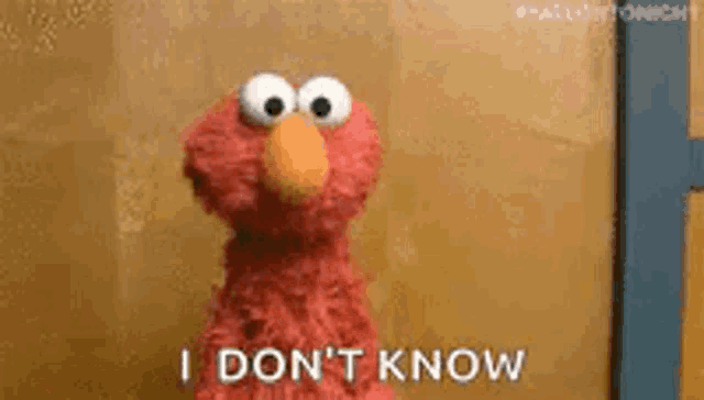 Elmo Shrug GIF