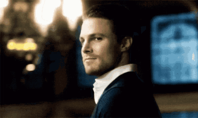Green Arrow Wink GIF