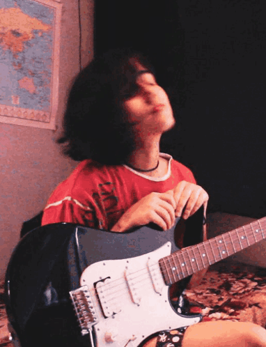 Headbanging Guitar GIF