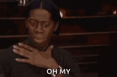 J Alexander Clutching My Pearls GIF