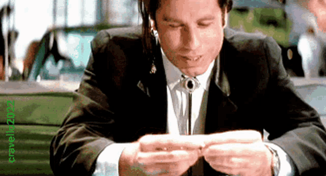 John Travolta Rolling A Joint GIF