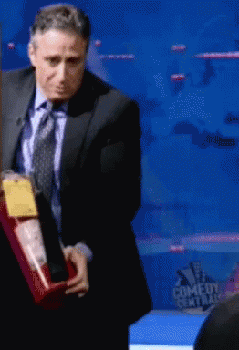 Jon Stewart Put Out Fire GIF