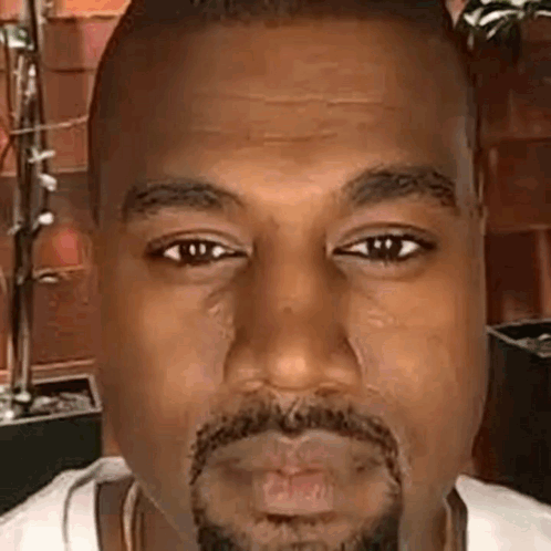 Kanye Staring Kanye Licking GIF