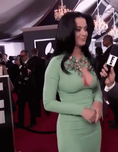 Katy Perry Hot Dress GIF. This 385 x 498 animated GIF is part of our katy perry whipped cream collection. Created by NatashaVictoriaEX. View the original…