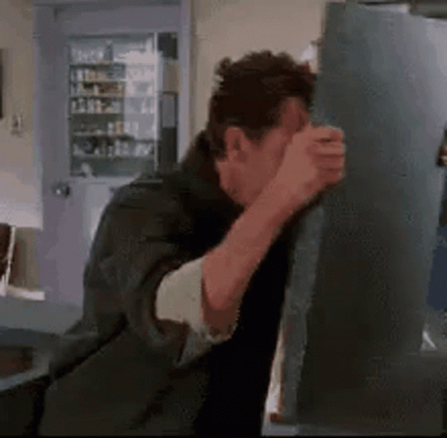 Knocking Head Stupid GIF