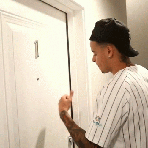 Knocking The Door Rhino GIF