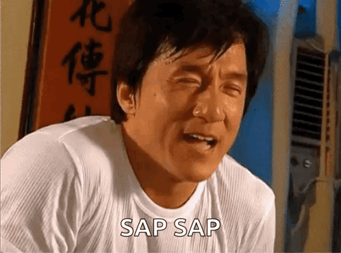 Licking Lips Jackie Chan GIF