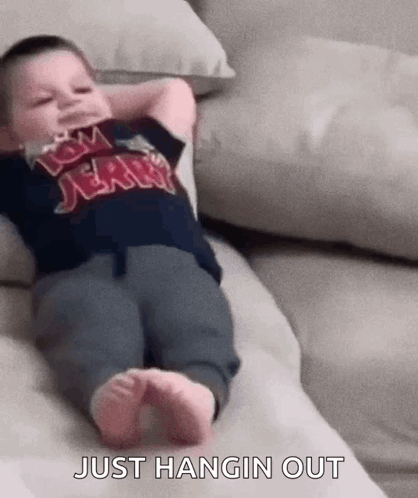 Lil Kid Chilling Chilling On Couch GIF