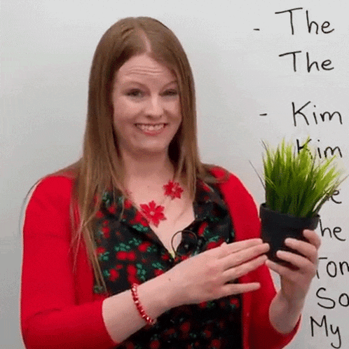 Looking At The Plant Emma GIF