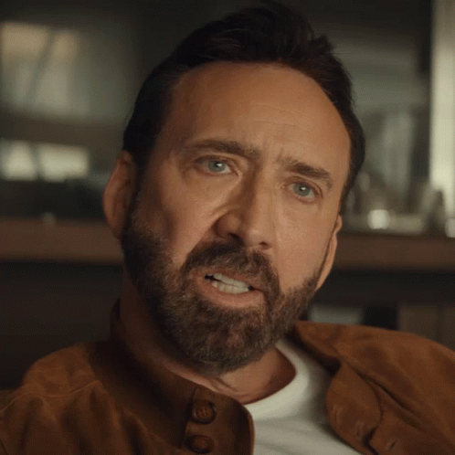 Looking Nick Cage GIF