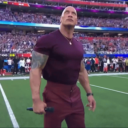 Looking Up Dwayne Johnson GIF