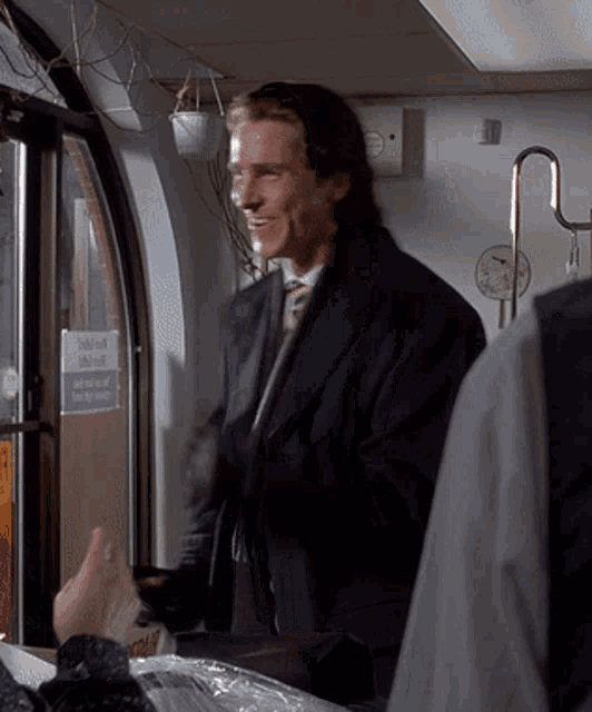 Patrick Bateman American Psycho GIF