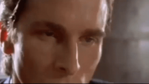 Patrick Bateman Dropping Phone GIF