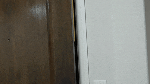 Peeking Mark Philips GIF