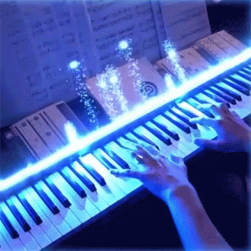 Playing Piano Toms Mucenieks GIF