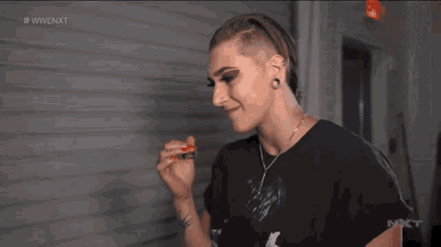 Rhea Ripley Hair Flick GIF