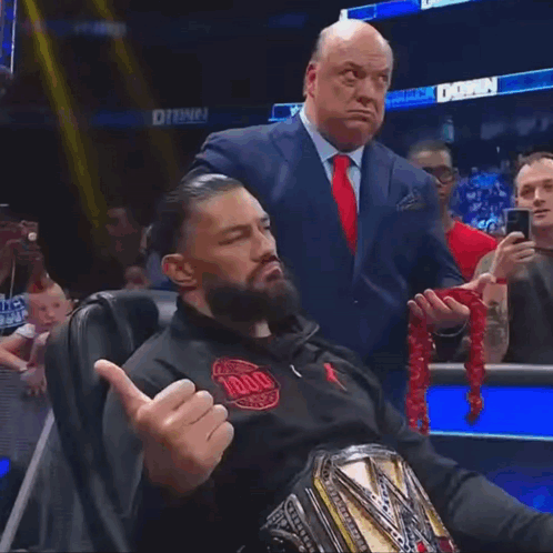 Roman Reings Paul Heyman GIF