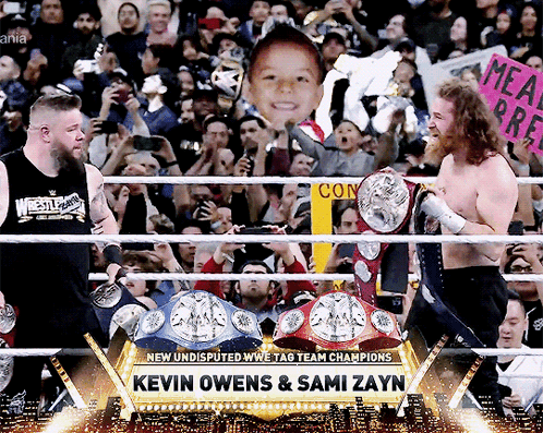 Sami Zayn Kevin Owens Raw And Smackdown Tag Titles Sami Zayn Kevin Owens Wrestlemania 39 GIF. This 498 x 397 animated GIF is part of our kevin owens…