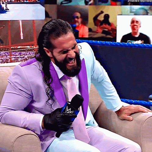 Seth Rollins Bayley GIF