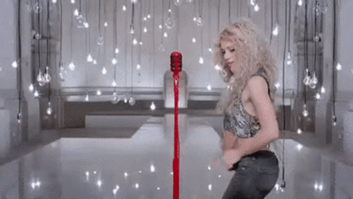 Shakira Microphone GIF. This 498 x 281 animated GIF is part of our shakira belly dancing collection. Created by Nickster92. View the original animation…