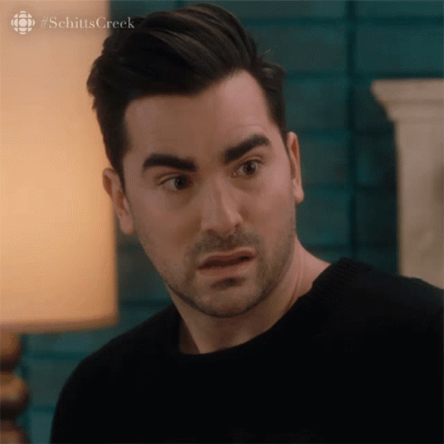 Shocked Dan Levy GIF