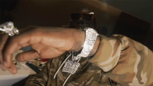 Showing My Watch Gucci Mane GIF. This 498 x 280 animated GIF is part of our looking at watch collection. Created by officialguccimane. View the original…