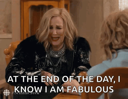 Shrug Catherine Ohara GIF