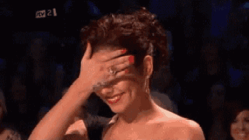 Shy Smiling GIF