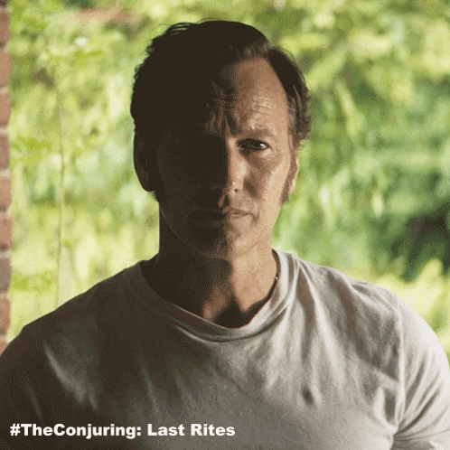 Smiling Ed Warren GIF
