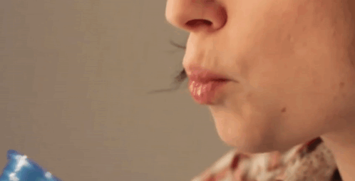Spitting Funny Woman GIF