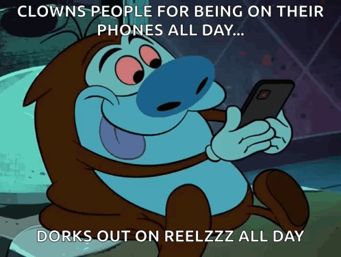 Stimpson J Cat Looking At The Phone GIF