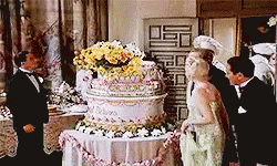 Surprise Birthdaycake GIF. This 250 x 150 animated GIF is part of our girl jumping out of cake collection. Related themes include surprise. Created by…