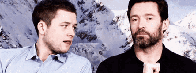 Taron Egerton Hugh Jackman GIF