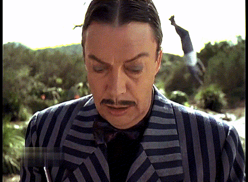 Tim Curry Gomez Addams GIF