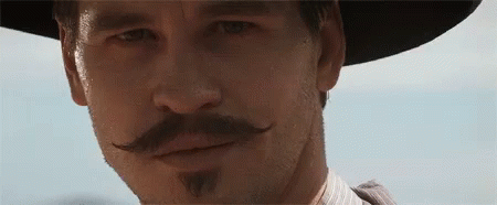 Wink Doc Holliday GIF