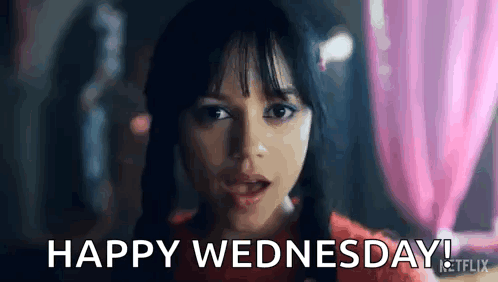 Winking Wednesday Addams GIF
