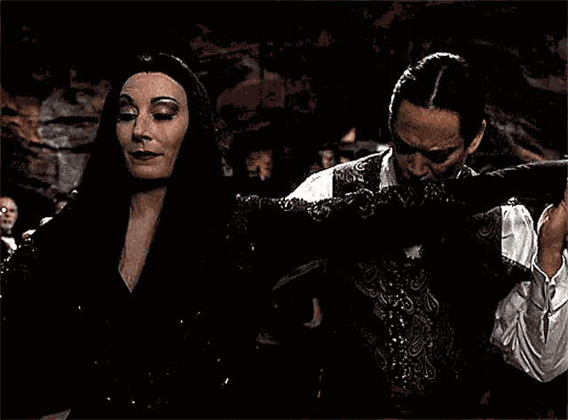 Addams Family Values Gomez And Morticia GIF