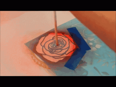 Airbrushing Onto Cookies GIF