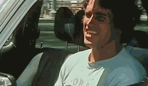 Arnold Schwarzenegger Flexing GIF