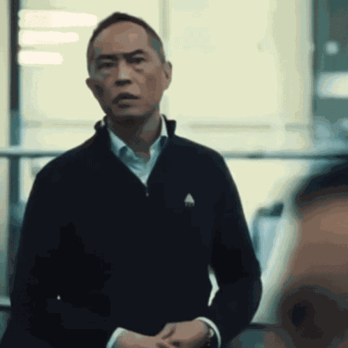 Asian Guy Waving Hand GIF